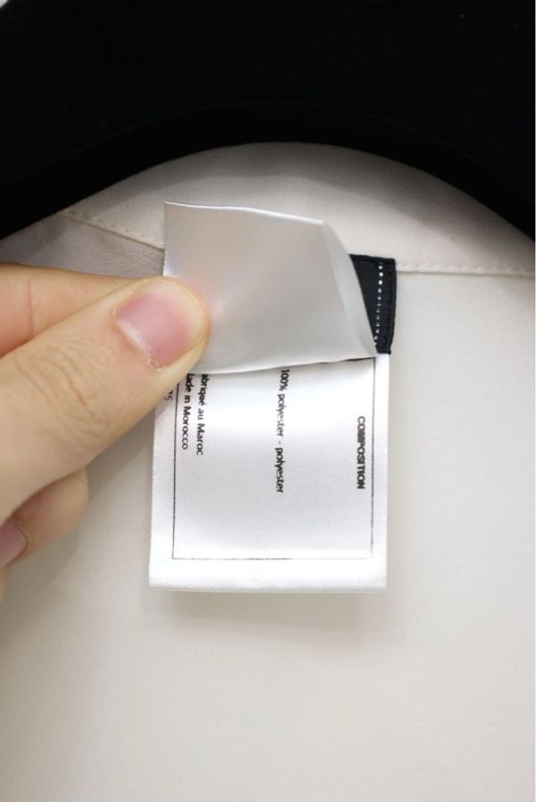 Chanel白色两口袋黑色蝴蝶结马甲背心上衣-15