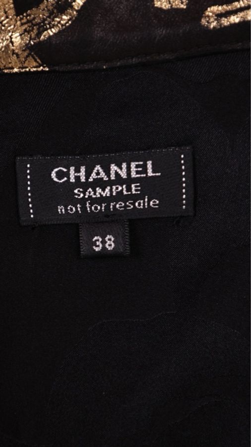 Chanel 19年埃及系列秀款黑金山茶花字母涂鸦半裙-33