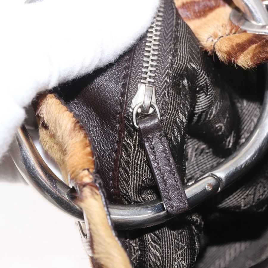 【日本直送】PRADA 棕色銀色小牛皮手拿包(正品)187486V-21