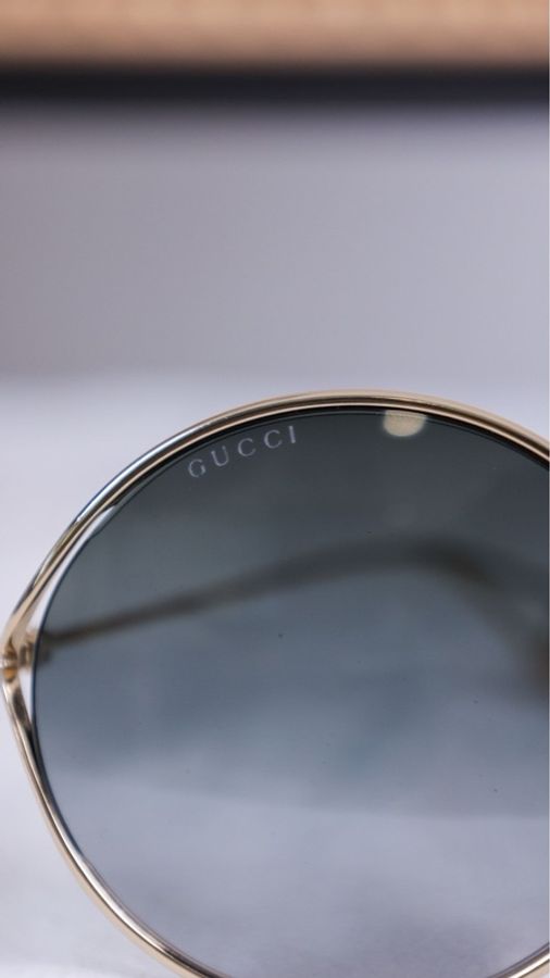 Gucci椭圆金边墨镜-19