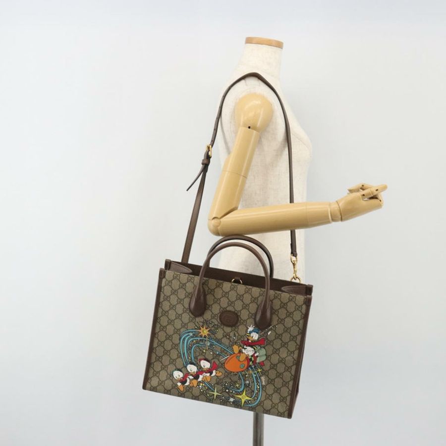 【日本直送】GUCCI GG Supreme 唐老鴨手提包 PVC 兩用 米色 金色 648134 正品 ep15088M-25