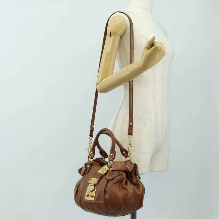 【日本直送】Miu Miu 側邊絲帶手提包 皮革 兩用 棕色 金色 正品 bs35815V-25