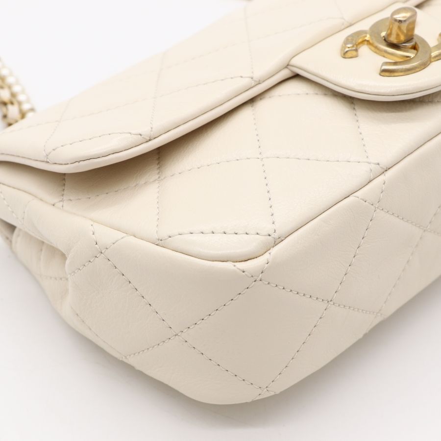 Chanel 香奈兒CF 20 cm 米白 羊皮 復古金釦 小珍珠背帶 細鏈條 斜挎包 單肩包-9