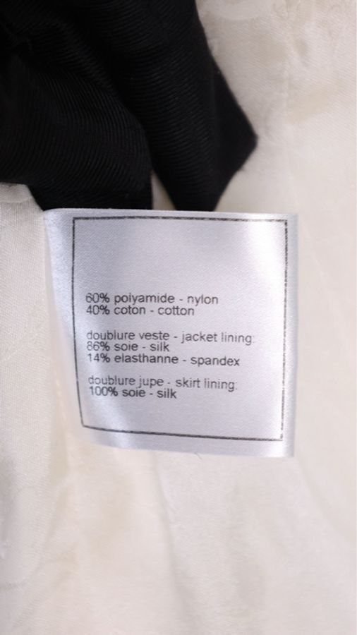 Chanel 09年春夏系列秀款黑白流苏滚边圆领两口袋外套半裙套装FR40 24/5-19