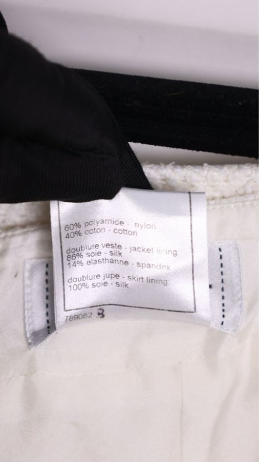 Chanel 09年春夏系列秀款黑白流苏滚边圆领两口袋外套半裙套装FR40 24/5-21