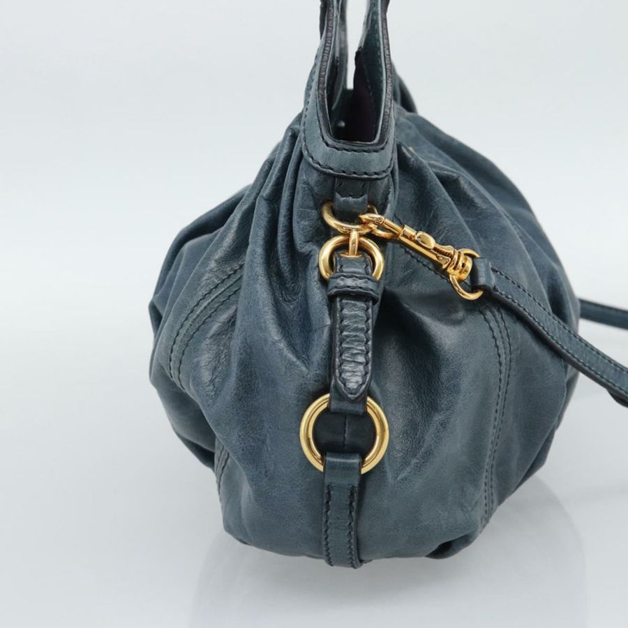 【日本直送】Miu Miu 皮革雙肩包,海軍藍/金色,正品 195286M-2