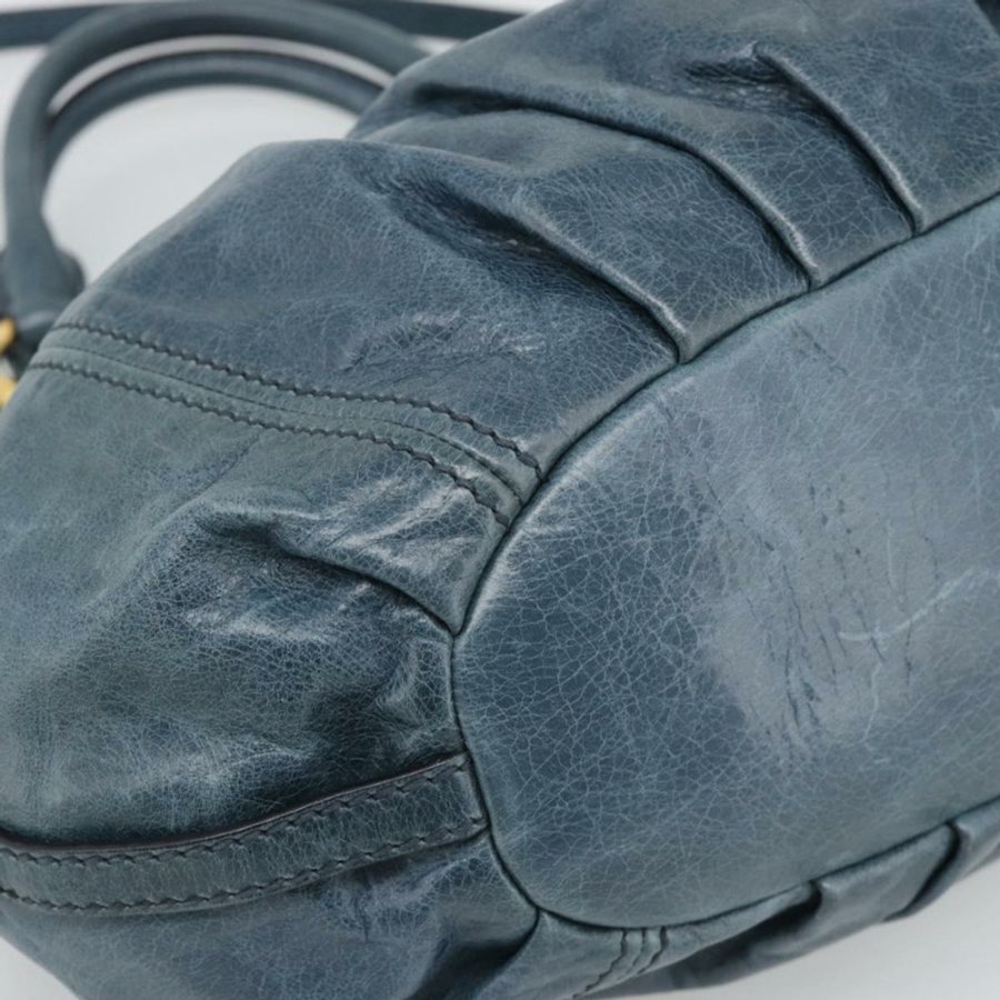 【日本直送】Miu Miu 皮革雙肩包,海軍藍/金色,正品 195286M-15