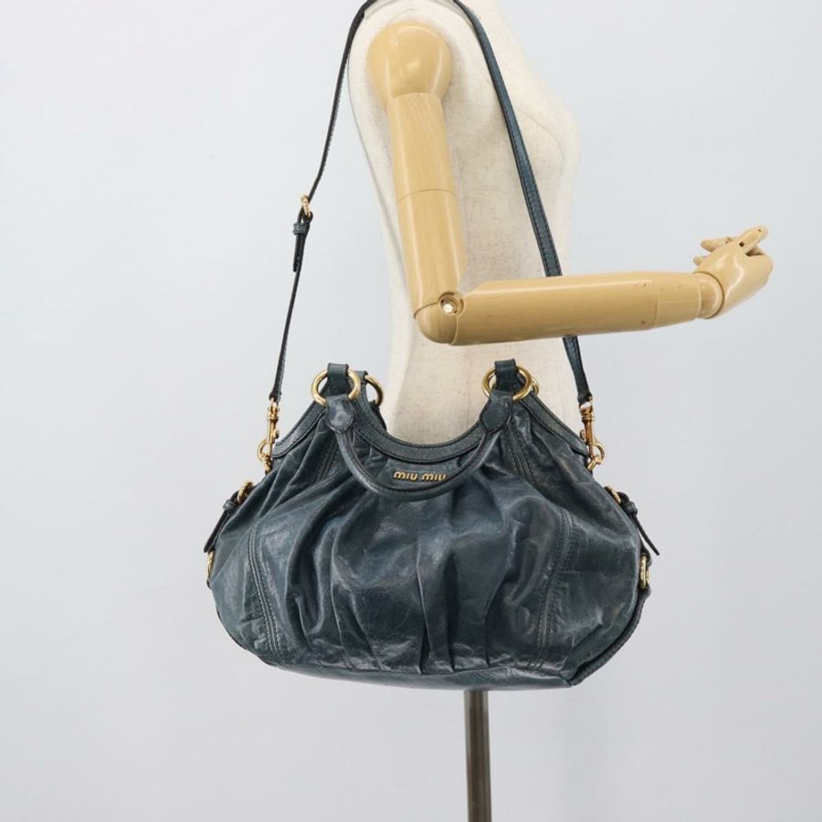 【日本直送】Miu Miu 皮革雙肩包,海軍藍/金色,正品 195286M-24