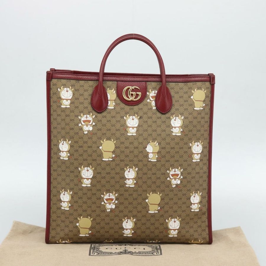 【日本直送】GUCCI哆啦A夢迷你GG手提包 PVC材質 兩用 米色/金色 654345 正品 195107SAM-25