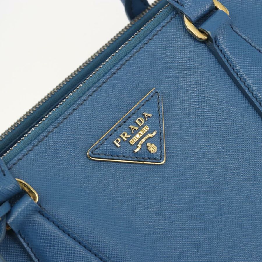 【日本直送】PRADA Safiano皮革雙肩包,藍金配色,正品 mr2852V-18