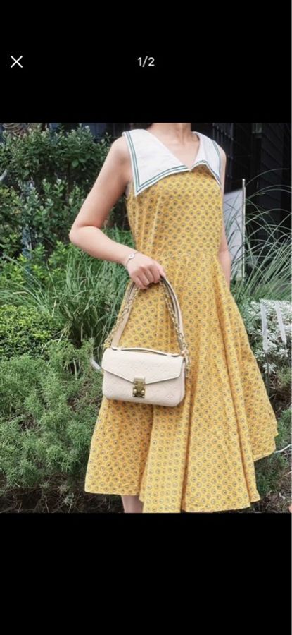 LV M22942 Pochette Métis East West 奶油色壓紋牛皮橫式郵差包-2